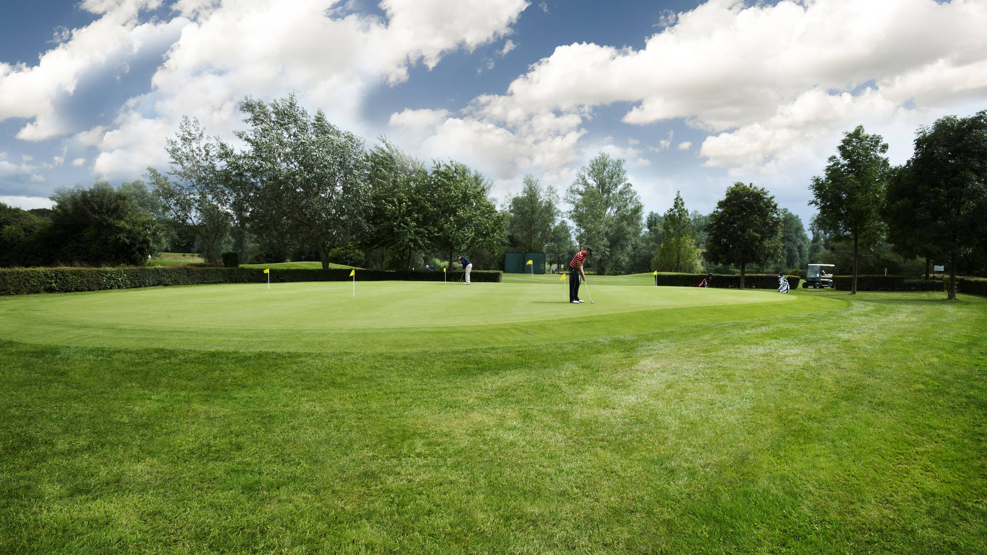 Golf player on Benton Hall's 9-hole Bishops golf course
