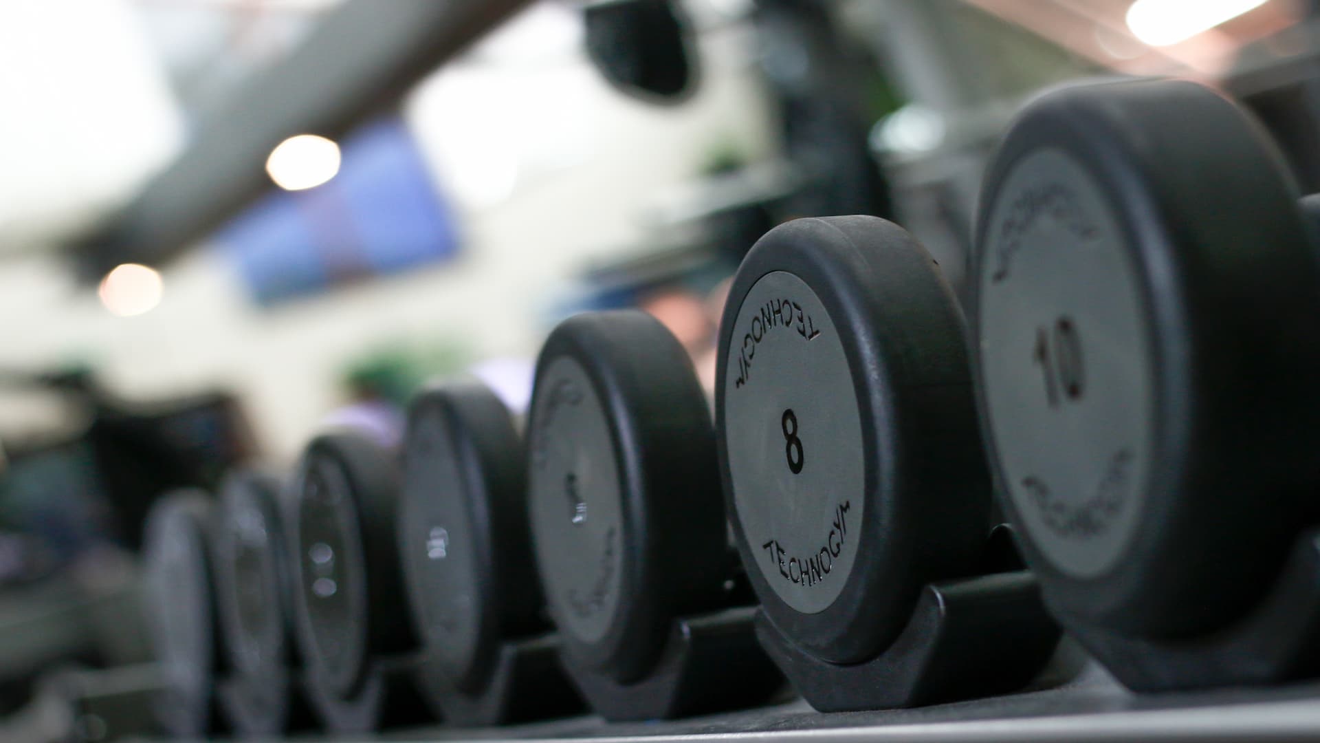 Set of free weights in the gym at Benton Hall